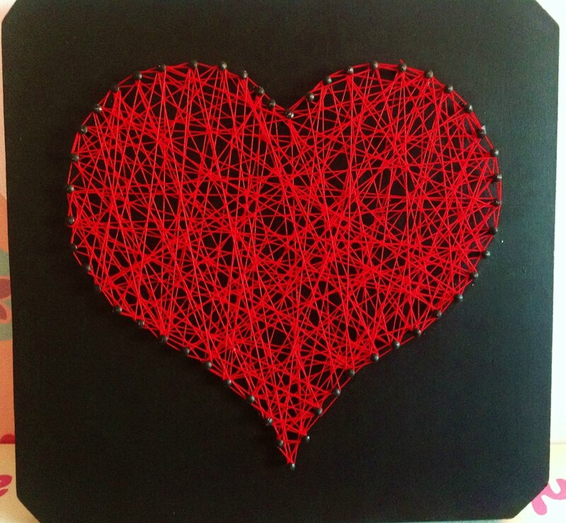un joli coeur en fil rouge