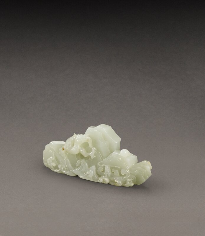 Sotheby's HK0771_A Pale Celadon Jade 'Mountain' Brushrest, Qing Dynasty, 18th Century, 12 cm(Lot 64)