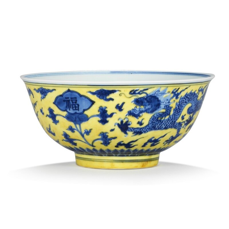 A rare yellow-ground blue and white 'dragon' bowl
