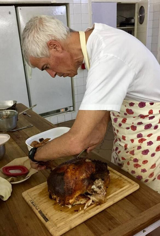The Ambassador carving the turkey – one of his traditional duties every Thanksgiving in the Barlerin home