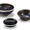 A <b>black</b>-<b>glazed</b> white-rimmed bowl, a small <b>black</b>-<b>glazed</b> white-rimmed dish and a russet-splashed bowl, Song dynasty