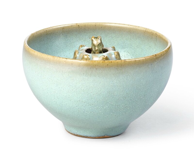 A Junyao 'human figure' 'puzzle' cup, Yuan dynasty