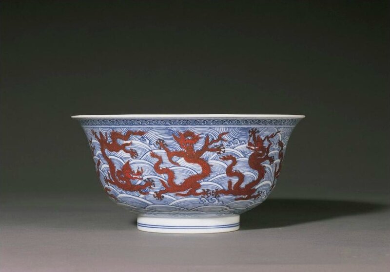 A fine blue and white and iron-red 'dragon' bowl, Mark and period of Kangxi