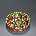  A <b>sancai</b>-<b>glazed</b> 'floral' bowl, Tang dynasty (618-907)