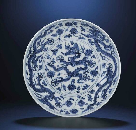 A fine and rare Ming blue and white 'dragon' dish, Zhengde four-character mark within double-circles and of the period (1506-1521)