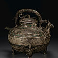 A <b>copper</b>-<b>inlaid</b> <b>bronze</b> ritual tripod pouring vessel, he, Warring States period (475-221 BC)
