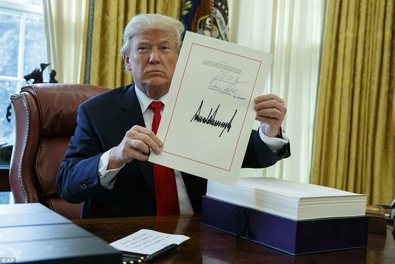 Donald Trump signs tax reform bill