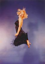 1959-10-NY-Jump_sitting-black_dress-by_halsman-015-1