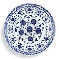 A fine and rare blue and white barbed 'floral scroll' <b>dish</b>, Ming dynasty, Yongle period (1403-1425)