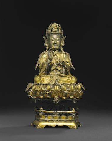 A gilt bronze figure of the Mahasthamaprapta Bodhisattva seated on a lotus throne, Ming dynasty