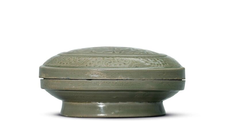 A rare carved and incised Yue 'peony' box and cover , Northern Song dynasty, 10th-11th century