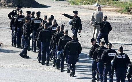 Riot_police_clear_Calais_migrant_camps