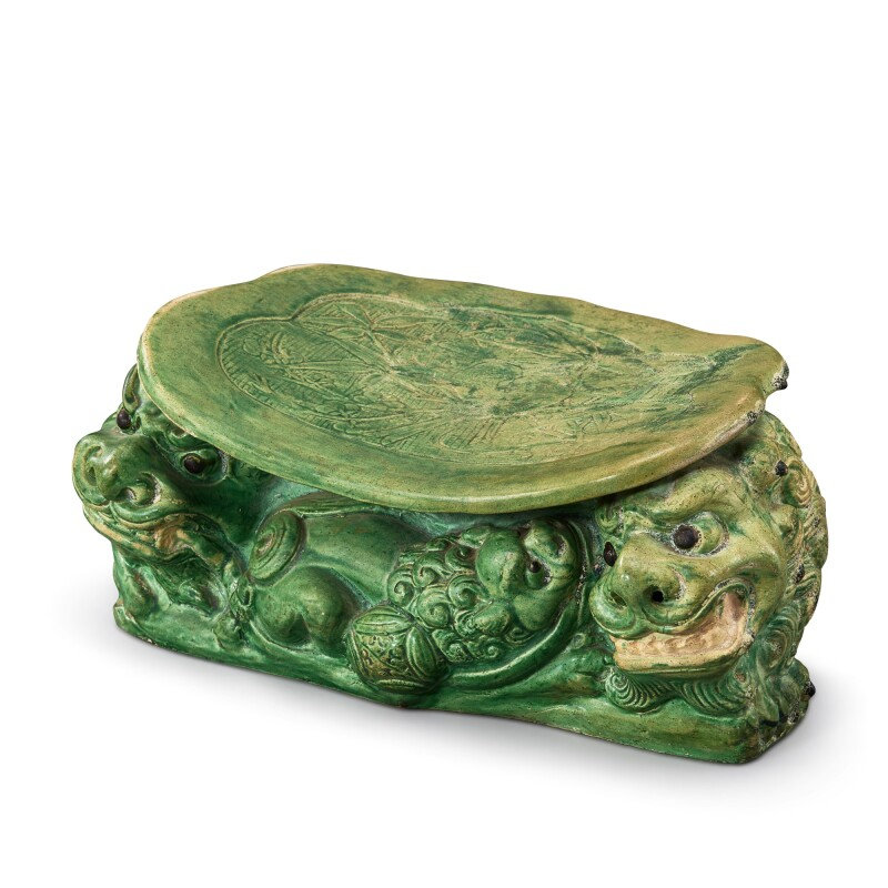 An inscribed Cizhou green-glazed 'lion' pillow, Song dynasty (960-1279)