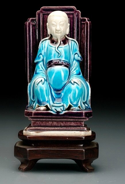 A small Wenzhu sitting on a throne, Kangxi period (1662-1722)