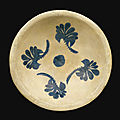 A large <b>Abbasid</b> tin-glazed dish attributable to Muhammad al-Salah, Mesopotamia, 9th century