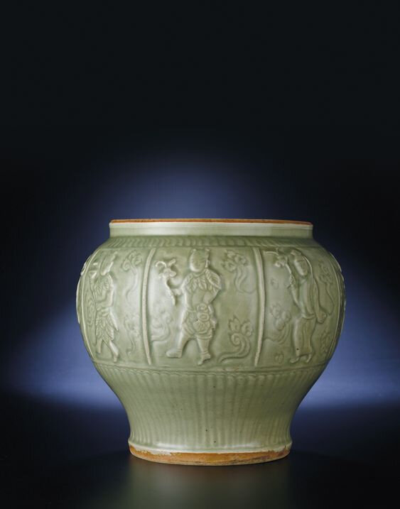 A rare moulded Longquan celadon baluster jar, Yuan-Early Ming dynasty, 14th century