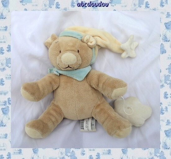 Doudou Musical Ours Marron Etoile sur le bonnet Nuage Sur la Ficelle Foulard Bleu Noukie's