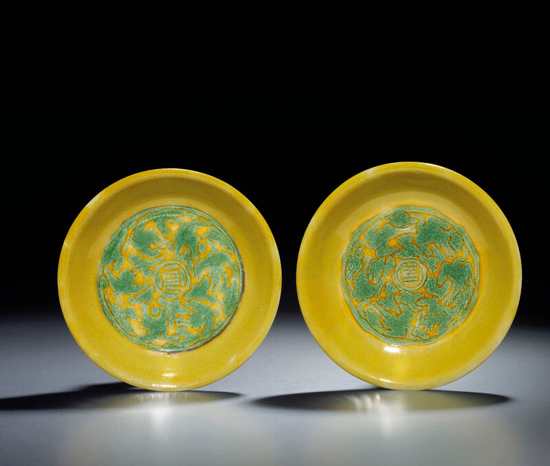 A pair of yellow and green enamelled 'Crane' dishes, jJajing six-character marks and of the period (1522-1566) 