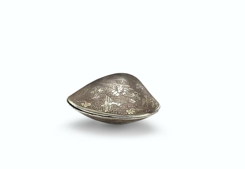 A parcel-gilt silver shell-form box and cover, Tang dynasty