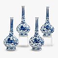 A set of four Chinese blue and white porcelain bottle vases with chilong, <b>lotus</b> <b>flower</b> mark, Kangxi period
