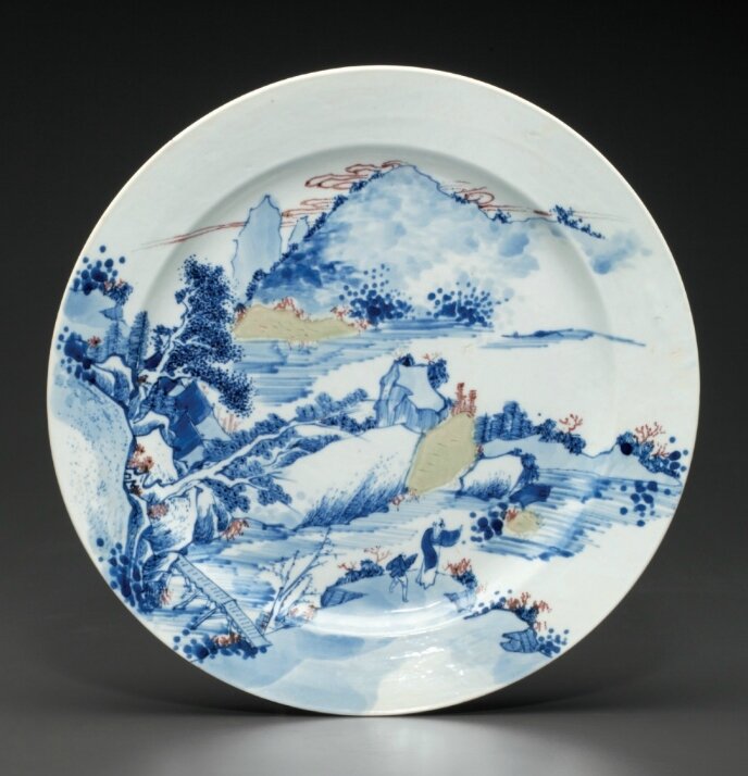An underglaze-blue and copper-red decorated celadon-glazed dish, Kangxi period, circa 1700