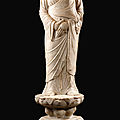 A finely carved white marble standing figure of a monk, probably <b>Ananda</b>, Tang dynasty (618-907)