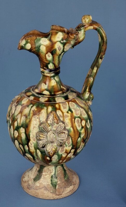 'Sancai'-glazed ewer, decorated with a flower design, Tang dynasty (618-907)