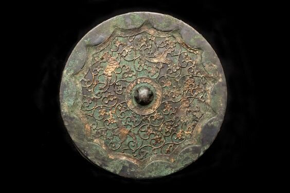 Goldsheet-applied mirror Tang dynasty (AD 618-906) © Compton Verney