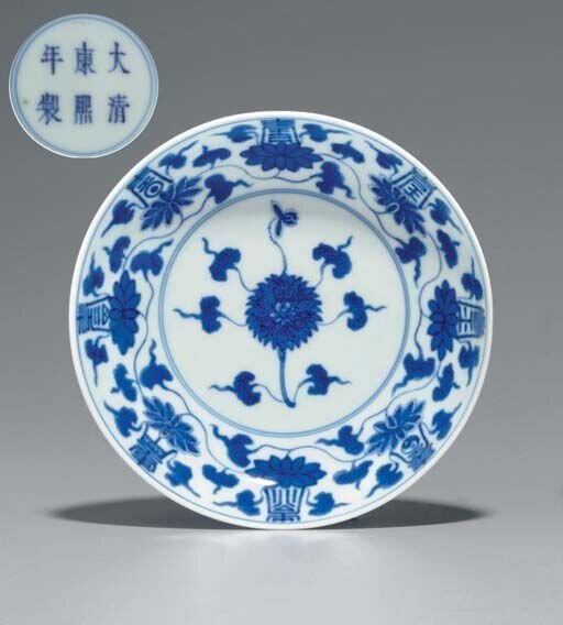 A_blue_and_white_Shou_character_saucer_dish__Kangxi_six_character_mark_in_underglaze_blue_within_a_double_circle_and_of_the_period__1662_1722_