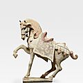 A painted pottery figure of a <b>prancing</b> <b>horse</b>, Tang dynasty (618–907)