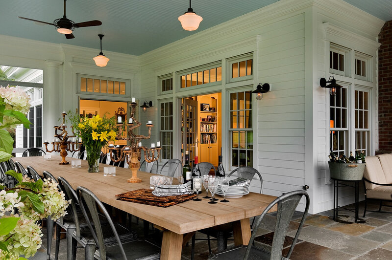 Splashy-Harbor-Breeze-Fans-vogue-New-York-Traditional-Porch-Decorating-ideas-with-beadboard-ceiling-big-table-bright-big-table-bright-porch-country-home-dining-porch-farmh