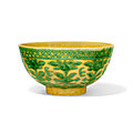 A green and yellow-glazed 'ruyi and peaches' bowl, <b>Kangxi</b> six-character mark and of the period (1662-1722)