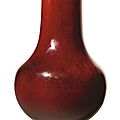 An inscribed 'Langyao' red-glazed truncated bottle neck vase, Qing dynasty, Kangxi period, yiwei year (in accordance with <b>1775</b>)