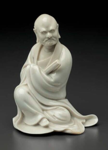 A small Dehua figure of a seated monk, China, Qing dynasty, 17th-18th century, from the Collection of Robert H