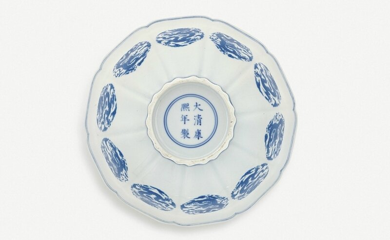 A finely painted blue-and-white Ming-style bowl with dragon medallions, mark and period of Kangxi