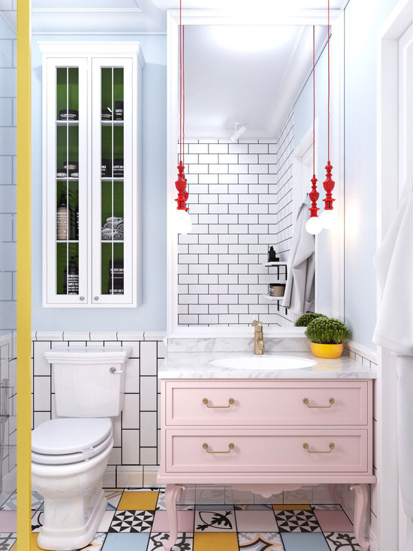 Pastel-and-bright-coloured-bathroom-pastel-pink-chest-white-porcelain-fixtures-multi-pattern-tiling