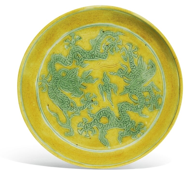 A Yellow-ground green-enamelled ‘Dragon’ dish, Jiajing mark and period