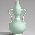 A rare celadon-glazed <b>double</b>-<b>gourd</b> vase, Qianlong seal mark and period (1736-1795)