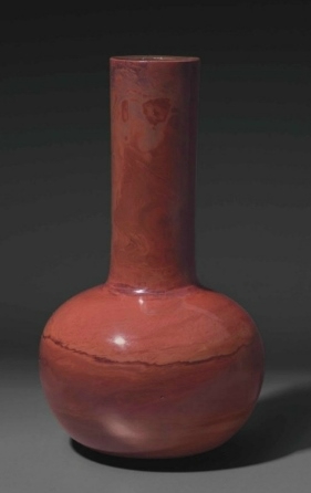 A small mottled-red 'realgar' glass bottle vase, China, Qing dynasty, 18th-19th century