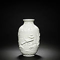 A rare biscuit porcelain relief-carved 'landscape' jar, <b>Daoguang</b> <b>seal</b> <b>mark</b> <b>and</b> <b>of</b> <b>the</b> <b>period</b> (1821-1850)