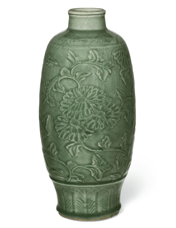 A carved Longquan celadon ovoid vase, Ming dynasty (1368-1644)