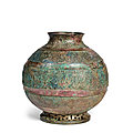 A very fine archaic <b>ritual</b> <b>bronze</b> 'dragons' wine vessel, hu, Early Warring States Period (475-221 BC)