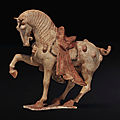 A painted pottery figure of a <b>prancing</b> <b>horse</b>, Tang dynasty (AD 618-907)