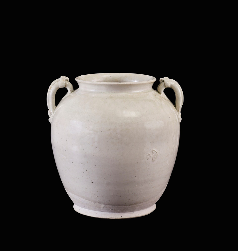 A white-glazed handled jar, late Tang-early Northern Song dynasty
