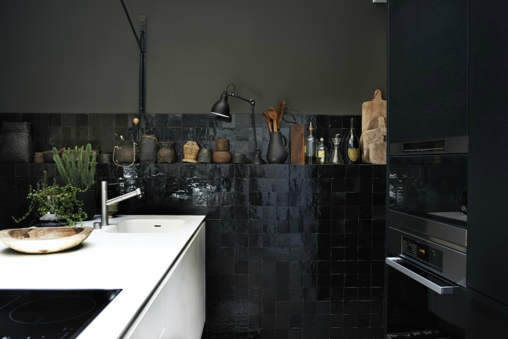 Monochrome-Home-Hilary-Robertson-black-tiled-kitchen-Remodelista