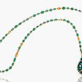 A <b>cabochon</b> <b>emerald</b>, sapphire, coloured sapphire and fire opal pendant necklace, by Louis Comfort Tiffany, Tiffany & Co