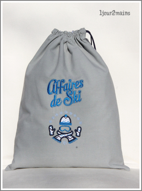 sac gris bleu affaires de ski