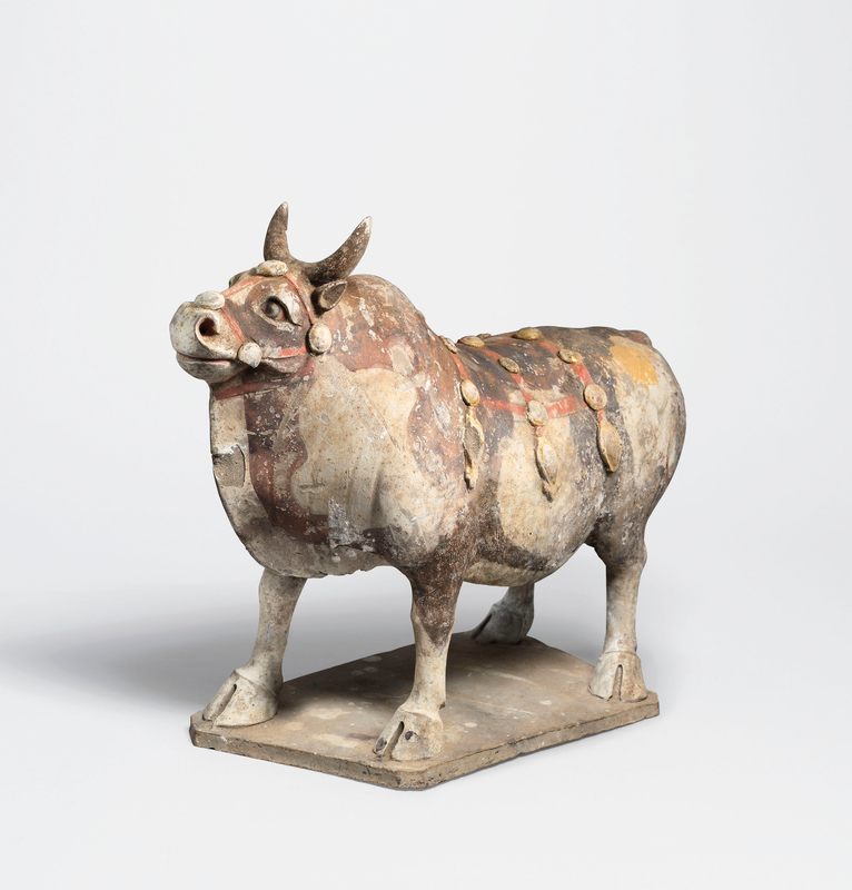A painted pottery model of a caparisoned ox, Eastern Wei Dynasty (534-550)