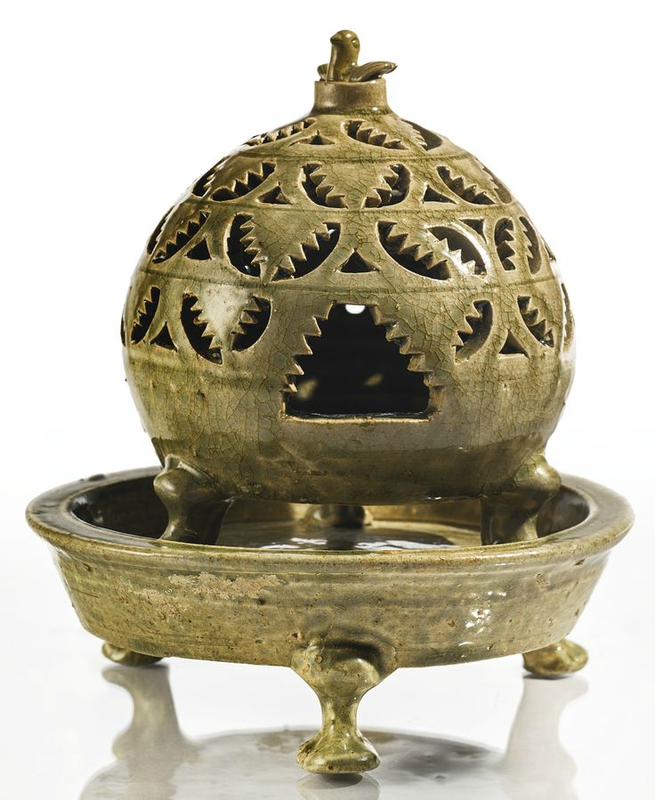 A reticulated 'Yue' censer, Western Jin dynasty, 3rd-4th century