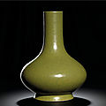 A tea-dust glazed bottle vase, <b>incised</b> <b>seal</b> <b>mark</b> <b>and</b> <b>period</b> <b>of</b> <b>Qianlong</b> (<b>1736</b>-<b>1795</b>)